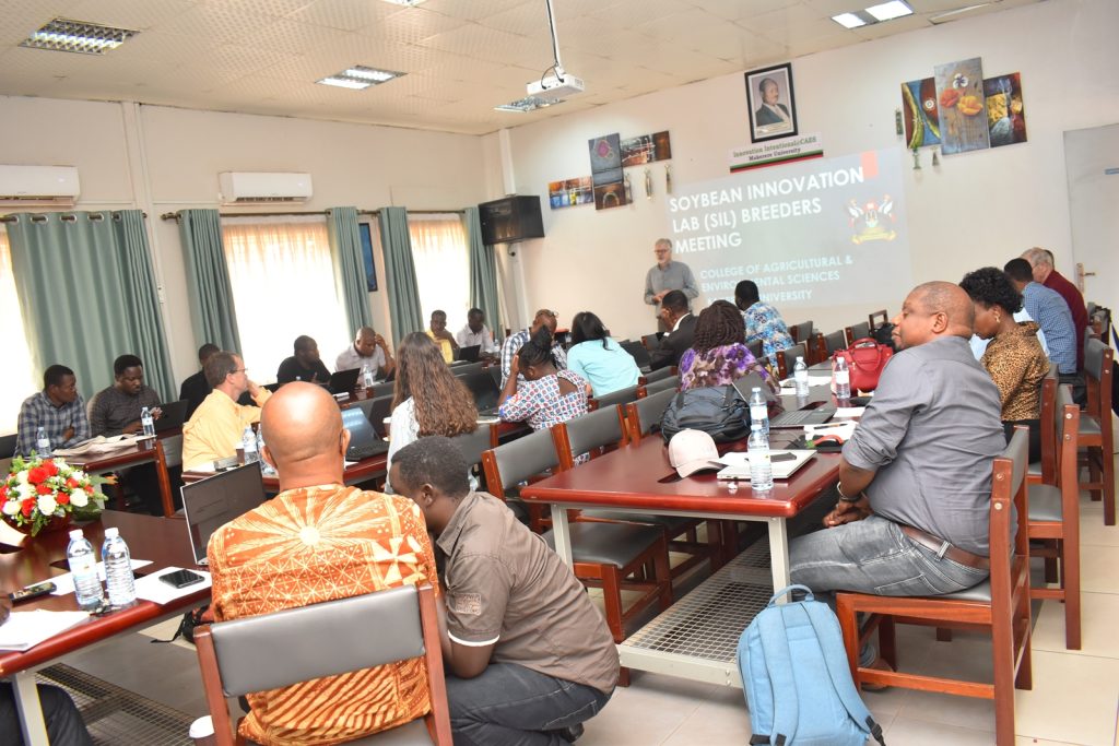 Participants following Prof. Diers' presentation during the meeting. Africa Soybean Breeders Meeting, 28th November to 1st December 2023, Makerere University, MUARIK, Kampala Uganda, East Africa.