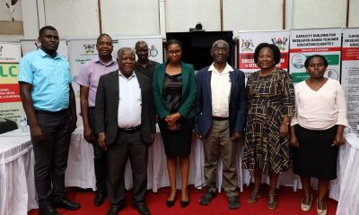 The quartet of scholars; Dr Henry Busulwa, Dr Harriet Nabushawo, Dr John Ssentongo, and Dr Allen Nalugwa with members of the research team that translated two resource books into Luganda and Lumasaaba languages pose for a group photo after the dissemination. December 2023, AVU Conference Room, Makerere University, Kampala Uganda, East Africa.