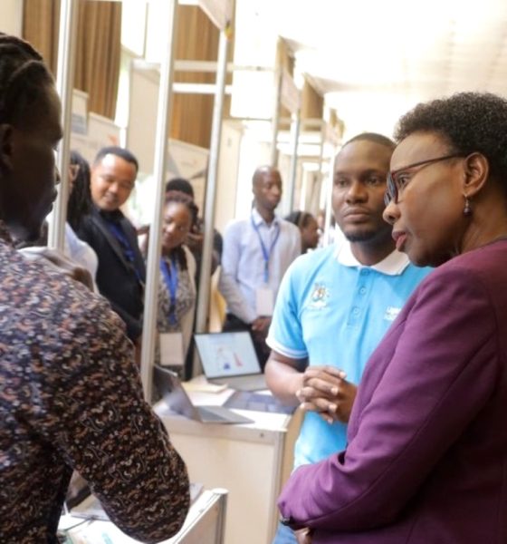 The Minister of Health, Hon. Dr. Jane Ruth Aceng (2nd R) visiting the METS stall manned by Jaba Jeremiah (L) and Musa Mwanje (blue polo shirt) at the First National Digital Health Conference held 13th - 14th November 2023. Photo: METS. Kampala Serena Hotel, Kampala Uganda, East Africa.