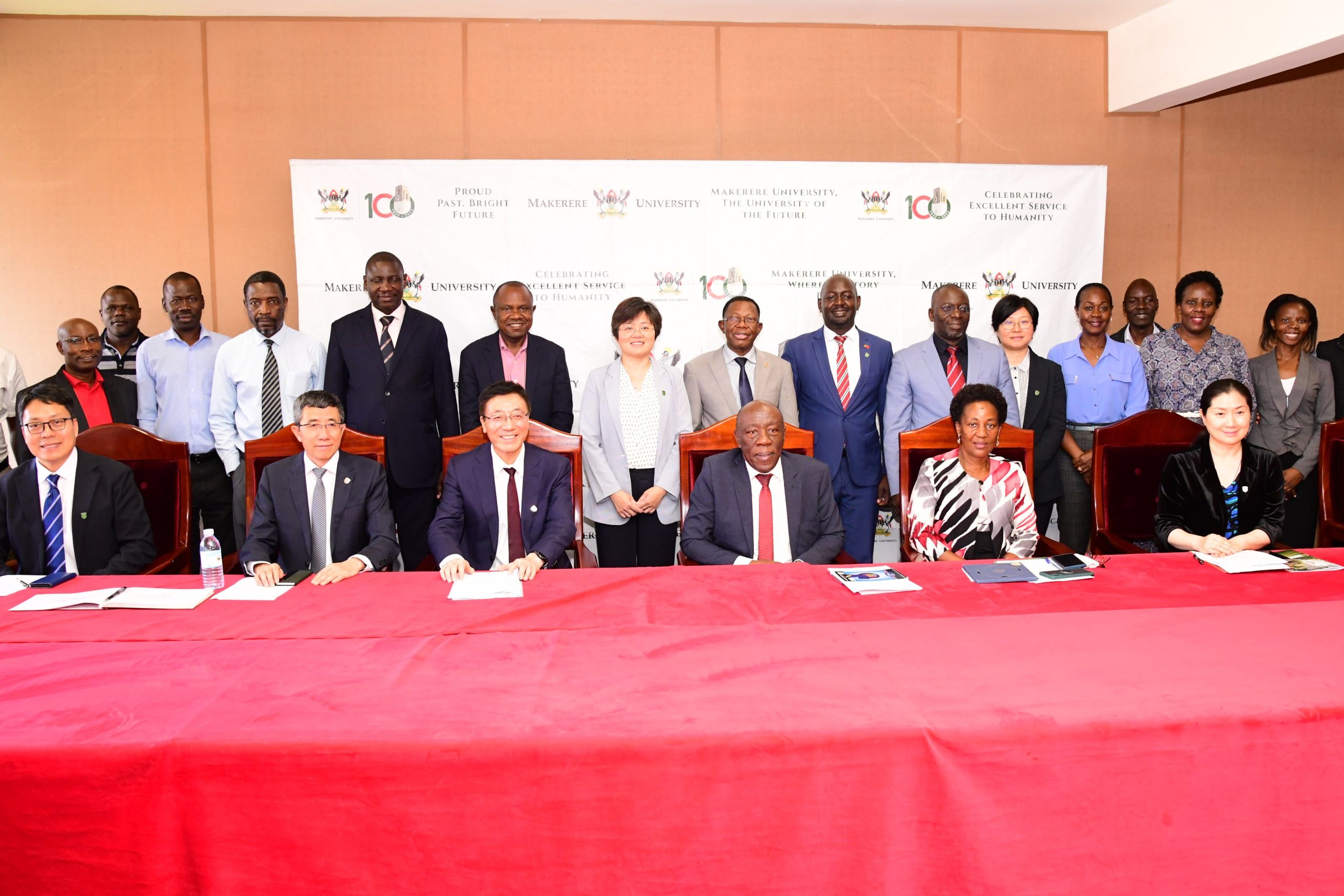 Seated Left to Right: Prof. Si Wei, Prof. Li Xiaoyun, President CAU-Prof. Sun Qixin, Ag. Vice Chancellor-Prof. Henry Alinaitwe, Principal CAES-Prof. Gorettie Nabanoga and Ms. Tang Ying with members of Management, the visiting delegation and other officials after the meeting on 24th November 2023.
