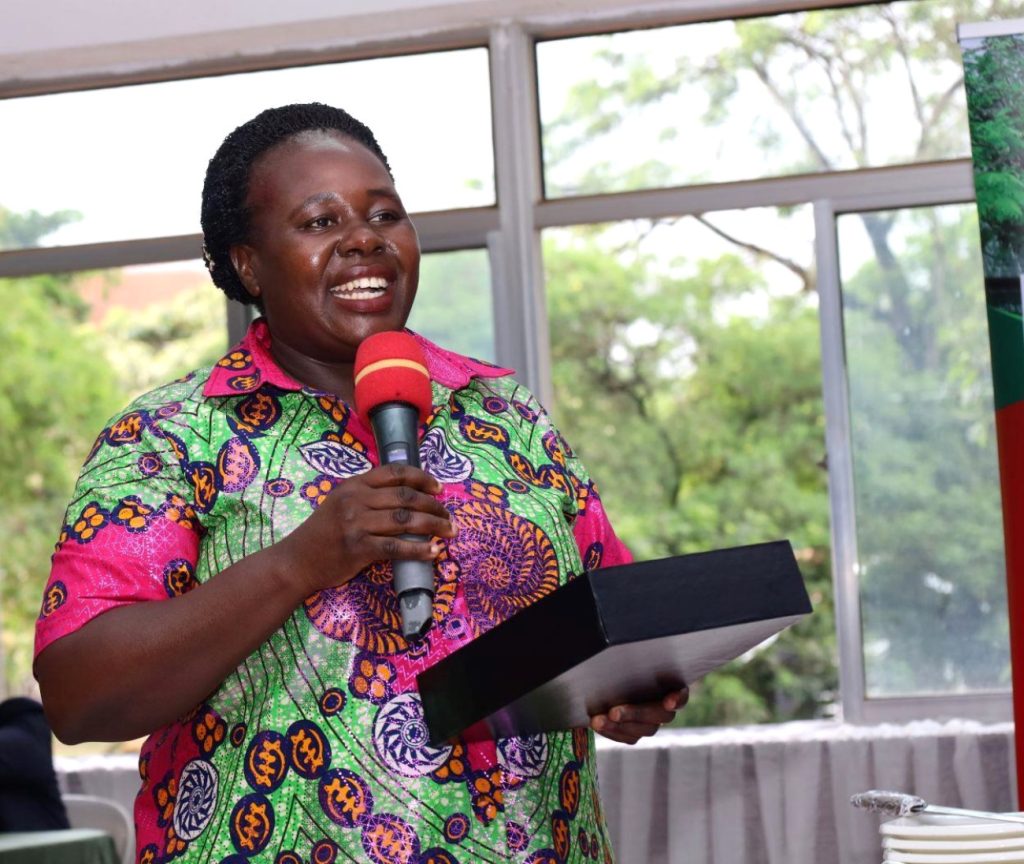 Dr. Sarah Kaddu speaking during the award ceremony. EASLIS@60 Luncheon, 10th November 2023, Big Lab 2, Block B, College of Computing and Information Sciences (CoCIS), Makerere University, Kampala Uganda, East Africa.