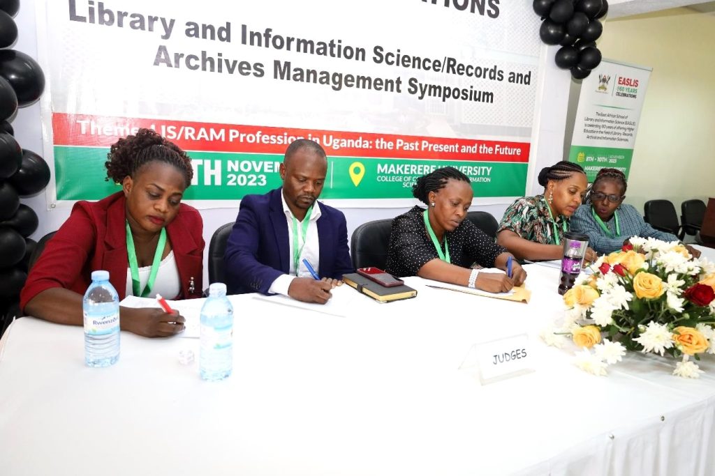 Some of the judges during the school quiz. EASLIS@60 Conference, 8th-10th November 2023, Big Lab 2, Block B, College of Computing and Information Sciences (CoCIS), Makerere University, Kampala Uganda, East Africa.