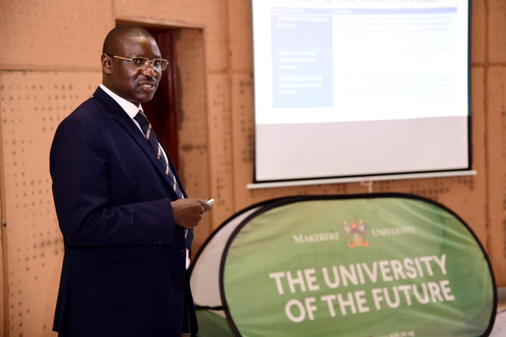 Dr. Cyprian Misinde presents findings from the evaluation exercise. Launch of SECAT Report for Semester Two 2022/2023 by the Quality Assurance Director, 24th November 2023, Yusuf Lule Central Teaching Facility Auditorium, Makerere University, Kampala Uganda, East Africa.