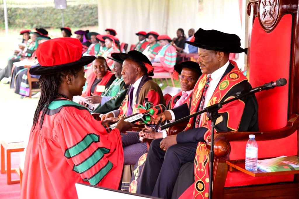 The only female PhD graduate at CoNAS Ms. Nagayi Kalule Jane Yawe receiving her award. 74th Graduation Ceremony, Day 1, 29th January 2024, Freedom Square, Makerere University, Kampala Uganda, East Africa.