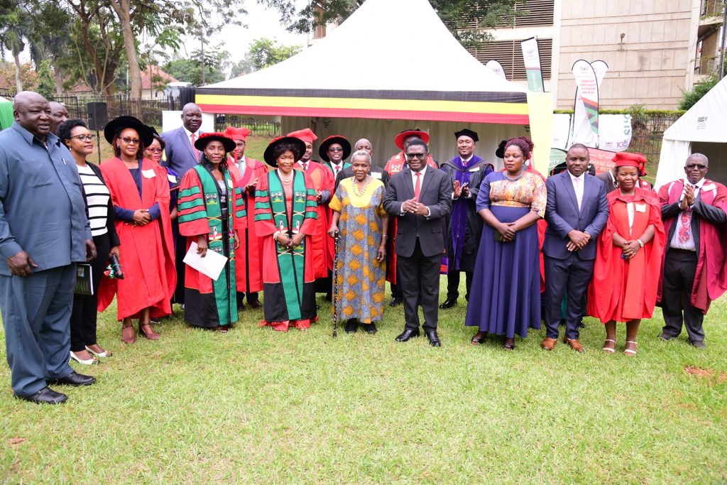 Hon. Betty Oyella Bigombe (5th Left) with members of her family and the law fraternity who included the Minister of Justice and Constitutional Affairs-Hon. Norbert Mao (5th Right), and the Lord Mayor of Kampala-His Worship Erias Lukwago (3rd Right). Left is the Minister of State for Foreign Affairs, Hon. Okello Oryem Henry. 74th Graduation Ceremony, Day 1, 29th January 2024, Freedom Square, Makerere University, Kampala Uganda, East Africa.