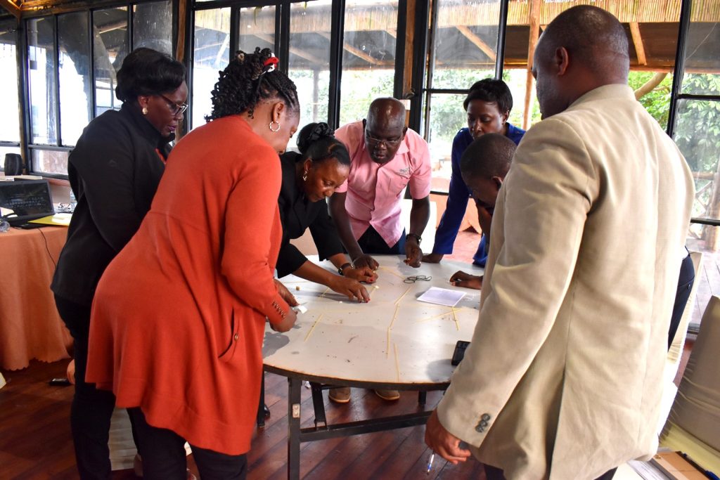 Participants in a practical session on soft skills. Makerere University CAES Management Retreat, Kalanoga Resort, Kampala, Uganda, East Africa.