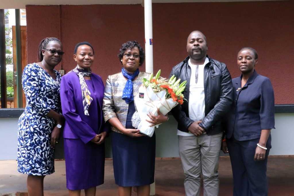 Dr. Sarah Bunoti with her family. Davies Lecture Theatre, College of Health Sciences, Makerere University, Kampala Uganda, East Africa.