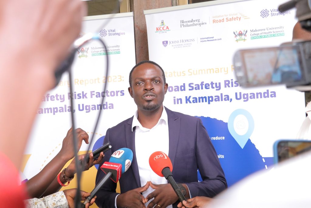 Mr. Bonny Balugaba, a Researcher based at the Trauma, Injuries and Trauma Unit of MakSPH speaks to the media shortly after the dissemination of the report at Hotel African, Kampala. Photo by Davidson Ndyabahika. Makerere University School of Public Health, Johns Hopkins International Injury Research Unit, KCCA, Vital Strategies launch of Status Summary Report 2023; Road Risk Factors for Kampala, Uganda, 16th January 2024, Hotel Africana, Kampala Uganda, East Africa.