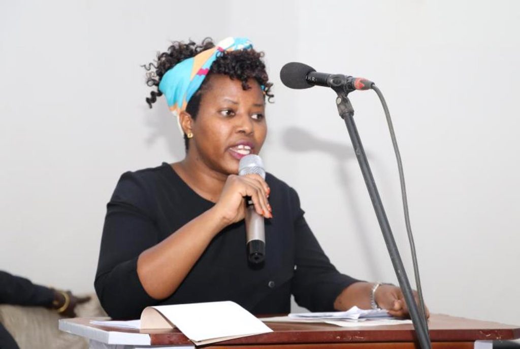 Director of theartre perfomance Dr. Viola Karungi speaking during the convention. National convention to foster national conversation on floating populations, specifically the Aguu phenomenon, 14th December 2023, Fairway Hotel, Kampala Uganda, organised by CHUSS and Amani Institute.