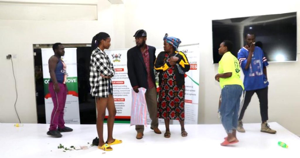Mak PAF students acting a play on how the Aguus wreck residents on their way. National convention to foster national conversation on floating populations, specifically the Aguu phenomenon, 14th December 2023, Fairway Hotel, Kampala Uganda, organised by CHUSS and Amani Institute.