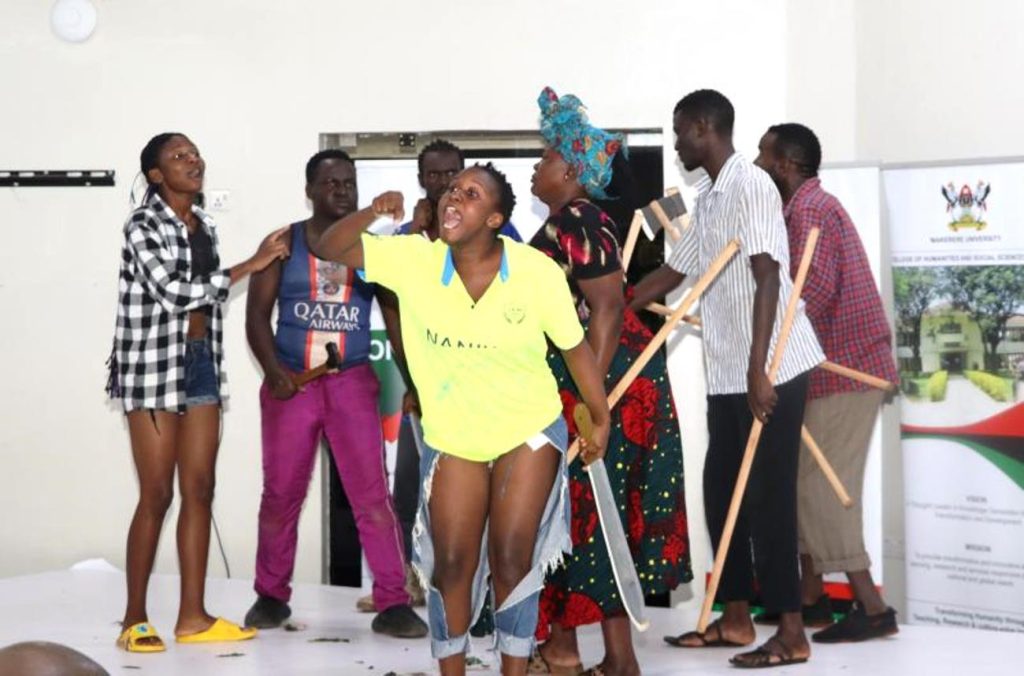 Mak PAF students perform on stage as the Aguus voicing their demand for social inclusion. National convention to foster national conversation on floating populations, specifically the Aguu phenomenon, 14th December 2023, Fairway Hotel, Kampala Uganda, organised by CHUSS and Amani Institute.
