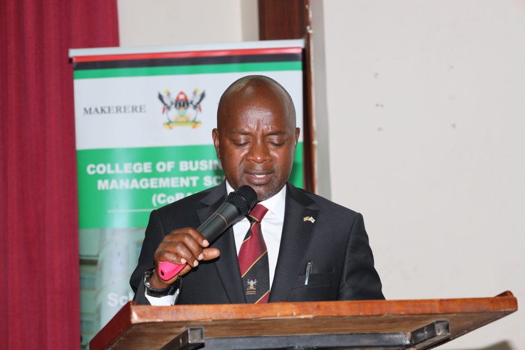 The Principal Investigator, Dr. Anthony Tibaingana makes his remarks. Project equipping over 400 refugees from over 10 African countries and local communities with entrepreneurial skills by College of Business and Management Sciences (CoBAMS), funded by Makerere University Research and Innovation Fund (Mak-RIF), 20th January 2024, CEDAT Conference Hall, Makerere University, Kampala Uganda, East Africa.