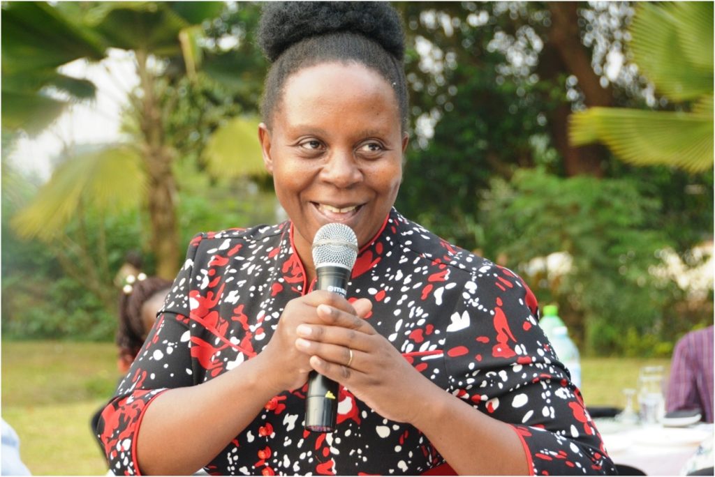 Mrs. Muhangi makes remarks on behalf of her husband Dr. Denis Muhangi. CoVAB farewell for outgoing staff, 19th January 2024, Ruth Keesling Gardens, College of Veterinary Medicine, Animal Resources and Biosecurity (COVAB), Makerere University, Kampala Uganda, East Africa.