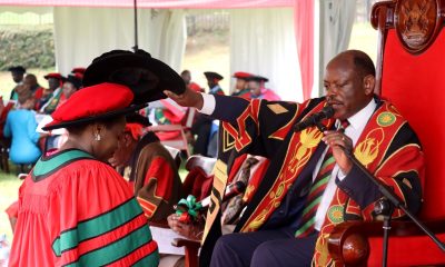 The Vice Chancellor, Prof. Barnabas Nawangwe (Right) confers the Degree of Doctor of Philosophy in Information Science upon Ms. Ilako Caroline (Left) on Day 3 of the 74th Graduation. 74th Graduation Ceremony, Day 3, 31st January 2024, College of Computing and Information Sciences (CoCIS), Freedom Square, Makerere University, Kampala Uganda, East Africa.