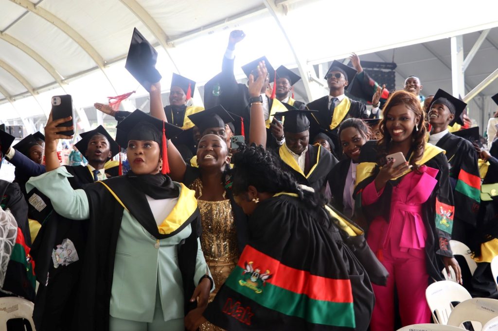 Students in jovial mode celebrate upon graduation. 74th Graduation Ceremony, Day 3, 31st January 2024, College of Computing and Information Sciences (CoCIS), Freedom Square, Makerere University, Kampala Uganda, East Africa.