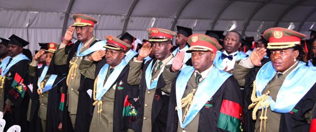 UPDF officers sing to the national anthems during the graduation ceremony in the Freedom Square. 74th Graduation Ceremony, Day 5, 2nd February 2024 Freedom Square, Makerere University, Kampala Uganda, East Africa.