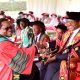 Professor Barnabas Nawangwe (Right) presents Dr. James Muleme with his award upon conferment on 29th January 2024. 74th Graduation Ceremony, Day 1, School of Public Health, College of Health Sciences (CHS), 29th January 2024, Freedom Square, Makerere University, Kampala Uganda, East Africa.