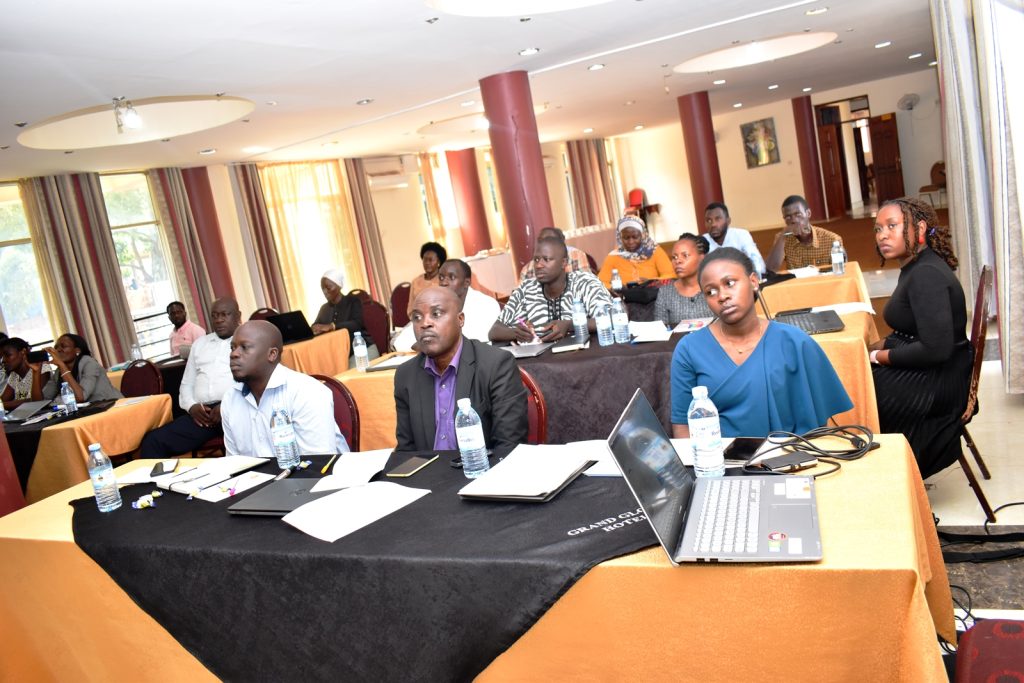 Participants keenly following the discussions during the meeting. Makerere University Department of Agricultural Production, College of Agricultural and Environmental Sciences (CAES), National Livestock Resources Research Institute (NaLIRRI), Ento Organic Farm Ltd, and Ghent University, Belgium, two-year project designed to harness circular and carbon-sequestering local feed resources to close the nutrition gap of cross-bred dairy cattle in Uganda inception meeting, 8th February 2024, Grand Global Hotel, Kampala Uganda.