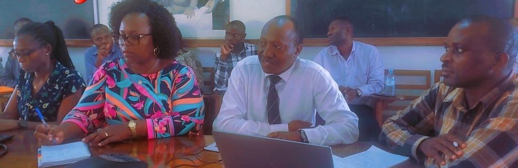 Left to Right: Dr. Esther Nanfuka, Dr. Ritah Nakanjako, Dr. Godfrey Siu who is giving the presenters feedback about their presentation and Dr. Aggrey Dhabangi.