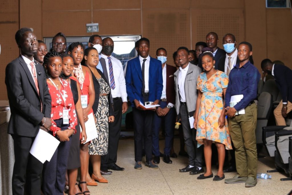 Shafik Senkubuge in a group photo with colleagues during the 18th Annual MUEHSA scientific conference. Yusuf Lule Central Teaching Facility Auditorium, Makerere University, Kampala Uganda, East Africa.