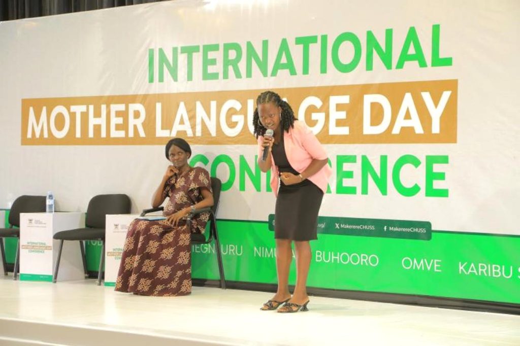 Assoc. Prof. Susan Kiguli (Left) and her student on stage performing a poem. Department of African Languages, School of Languages, Literature and Communication International Mother Language Day Conference, Launch of Sir Edward Muteesa II Museum, on 21st February 2024, No. 95 Quarry Road & Yusuf Lule Central Teaching Facility Auditorium, Makerere University, Kampala Uganda, East Africa. 