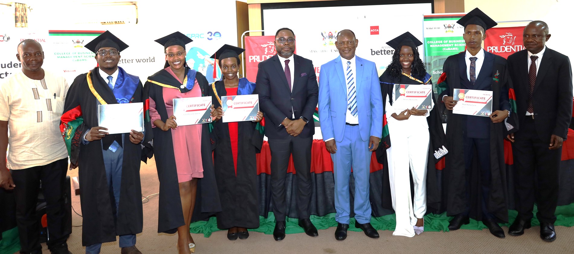 The Vice Chancellor-Prof. Barnabas Nawangwe, Principal CoBAMS-Prof. Eria Hisali, Dr. Felix Wamono and CEO of Prudential Assurance-Mr Tetteh Ayitevie with the top five Actuarial Science students of the 74th Graduation Ceremony. Prudential Assurance, ACCA Uganda and EPRC award ceremony for best performing business graduates, 12th March 2024, Conference Room, Room 2.2B, Level 2, School of Business, College of Business and Management Sciences (CoBAMS), Makerere University, Kampala Uganda, East Africa.