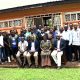 The Coordinator of the programme, Dr Donald Kugonza (seated right) together with the guests and trainees at the Continuing Agricultural Education Centre (CAEC), MUARIK where the training was conducted. Makerere University in collaboration with ILRI, the Ministry of Agriculture, Animal Industry, and Fisheries (MAAIF) and the National Animal Genetic Resources Centre and Data Bank (NAGRC & DB) Training of over 20 animal health practitioners from Central Uganda pig artificial insemination training, 28th February-3rd March 2024, Continuing Agricultural Education Centre (CAES), Makerere University Agricultural Research Institute Kabanyolo (MUARIK), Wakiso, Uganda, East Africa.