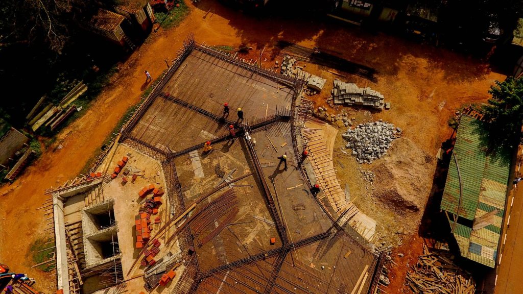 An overhead shot of works on the main entrance for the main block for the new building taking shape with slab works on top. This section will act as a reception area and host a lobby. Main Campus, Makerere University, Kampala Uganda, East Africa.
