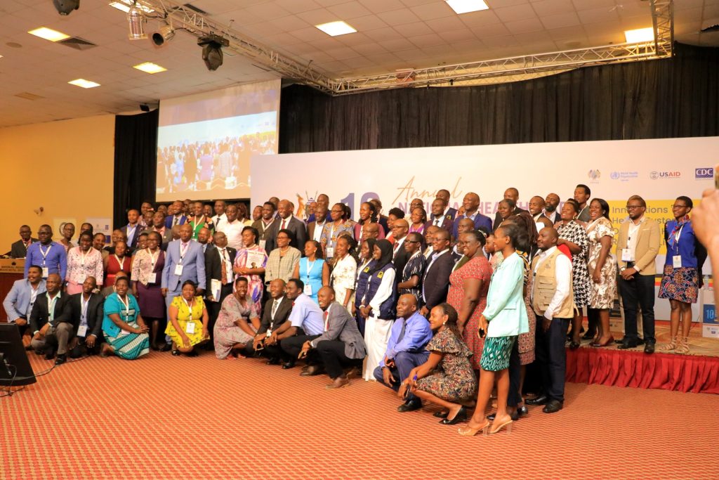 Stakeholders during the launch of the report in a group photo. Launch of the first ever Harmonized Health Facility Assessment (HHFA) jointly conducted by the School of Public Health, Makerere University, Kampala UgandaH and the Ministry of Health during the 10th Annual National Health Care Quality Improvement Conference, 12th March 2024, Imperial Resort Beach Hotel, Entebbe Uganda, East Africa.