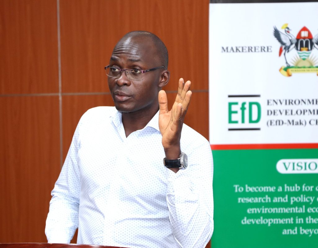 Dr. Nicholas Kilimani wrapped up the workshop proceedings. EfD-Makerere University Center, Kampala Uganda, training to identify research and data gaps to address the persistent environmental and natural resources (ENR) challenges in Uganda, 14th to 15th March 2024, Esella Country Hotel.
