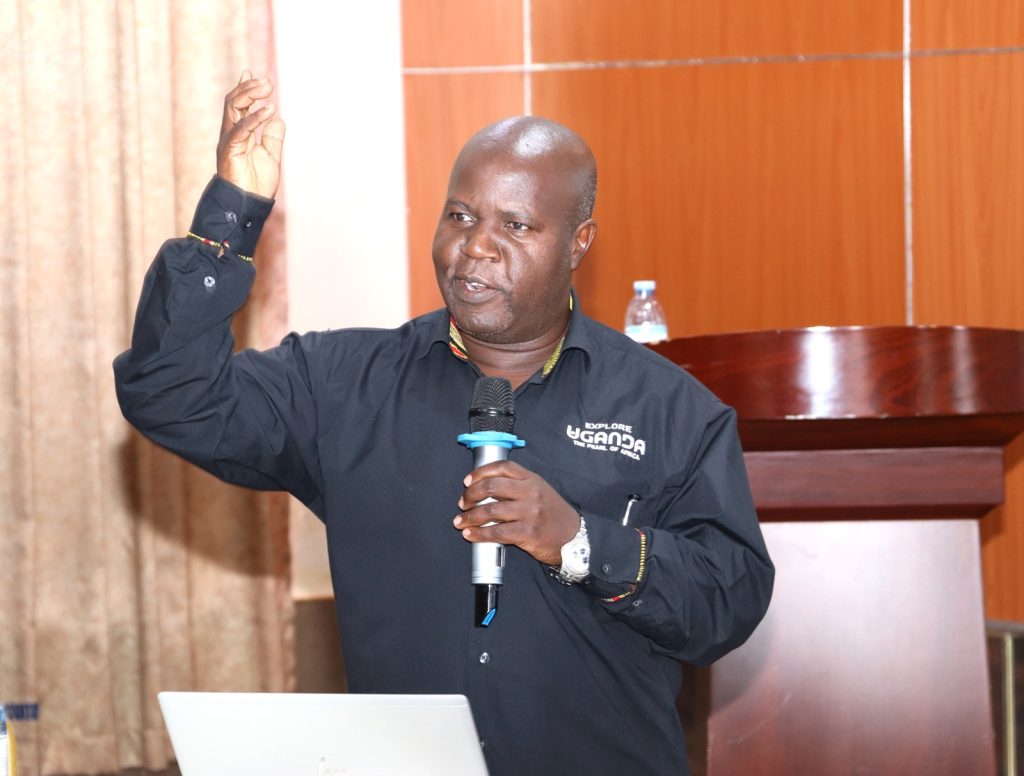 Dr. Ronald Kaggwa presenting on the national priorities. EfD-Makerere University Center, Kampala Uganda, training to identify research and data gaps to address the persistent environmental and natural resources (ENR) challenges in Uganda, 14th to 15th March 2024, Esella Country Hotel.