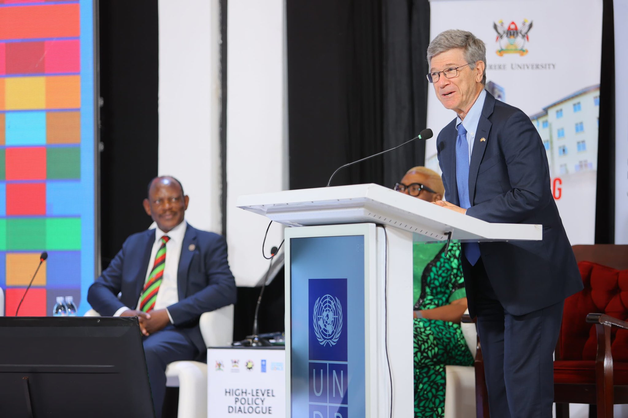 Prof. Jeffrey Sachs (Right) delivers his keynote address at the High-Level Policy Dialogue as Vice Chancellor-Prof. Barnabas Nawangwe (Left) listens on 28th February 2024. High-Level Policy Dialogue organized by the United Nations Development Programme (UNDP), in partnership with the Office of the Prime Minister (OPM), National Planning Authority and Makerere University on the theme “Accelerating the Sustainable Development Goals through leveraging Innovating Financing, the Parish Development Model, and Science and Technology”, Keynote address by Prof. Jeffrey Sachs, 28th February 2024, Yusuf Lule Central Teaching Facility Auditorium, Makerere University, Kampala Uganda, East Africa.