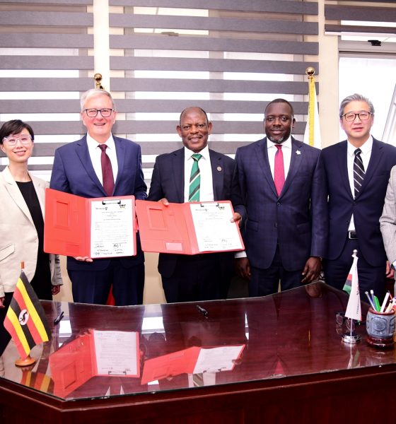 The Vice Chancellor-Prof. Barnabas Nawangwe (Centre) and UWO President-Dr. Alan Shepard (3rd Left) show off the signed MoU as Left to Right: UWO's Dr. Opiyo Oloya and Dr. Lily Cho as well as University Secretary-Mr. Yusuf Kiranda, UWO's Dr. John Yoo and Head of Advancement-Mr. Awel Uwihanganye witness on 21st March 2024. Frank Kalimuzo Central Teaching Facility, Makerere University, Kampala Uganda, East Africa.