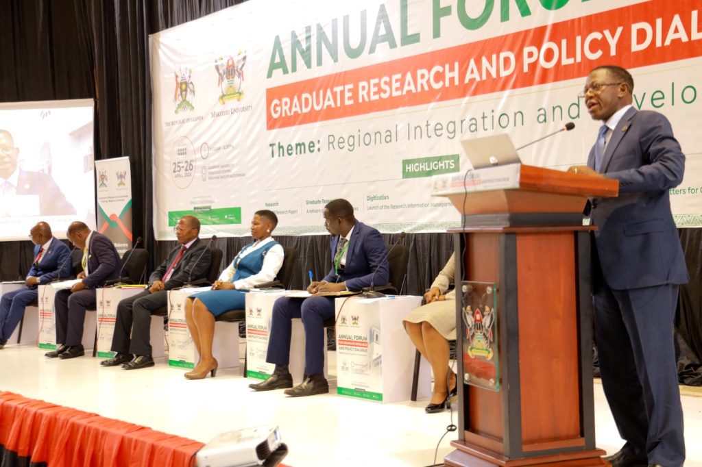 Prof. Buyinza Mukadasi (Right) makes his remarks. Annual Forum for Graduate Research and Policy Dialogue, 25th April 2024, Yusuf Lule Central Teaching Facility Auditorium, Makerere University, Kampala Uganda, East Africa.