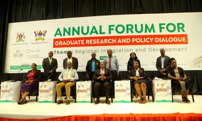 Representative of the DVCAA-Prof. Umar Kakumba, Prof. Buyinza Mukadasi (Centre) flanked by Prof. Edward Bbaale (2nd Left), Ms. Clare Cheromoi (2nd Right) and other officials at the opening ceremony of Day 2 of the Forum on 26th April 2024. Annual Forum for Graduate Research and Policy Dialogue, 26th April 2024, Yusuf Lule Central Teaching Facility Auditorium, Makerere University, Kampala Uganda, East Africa.