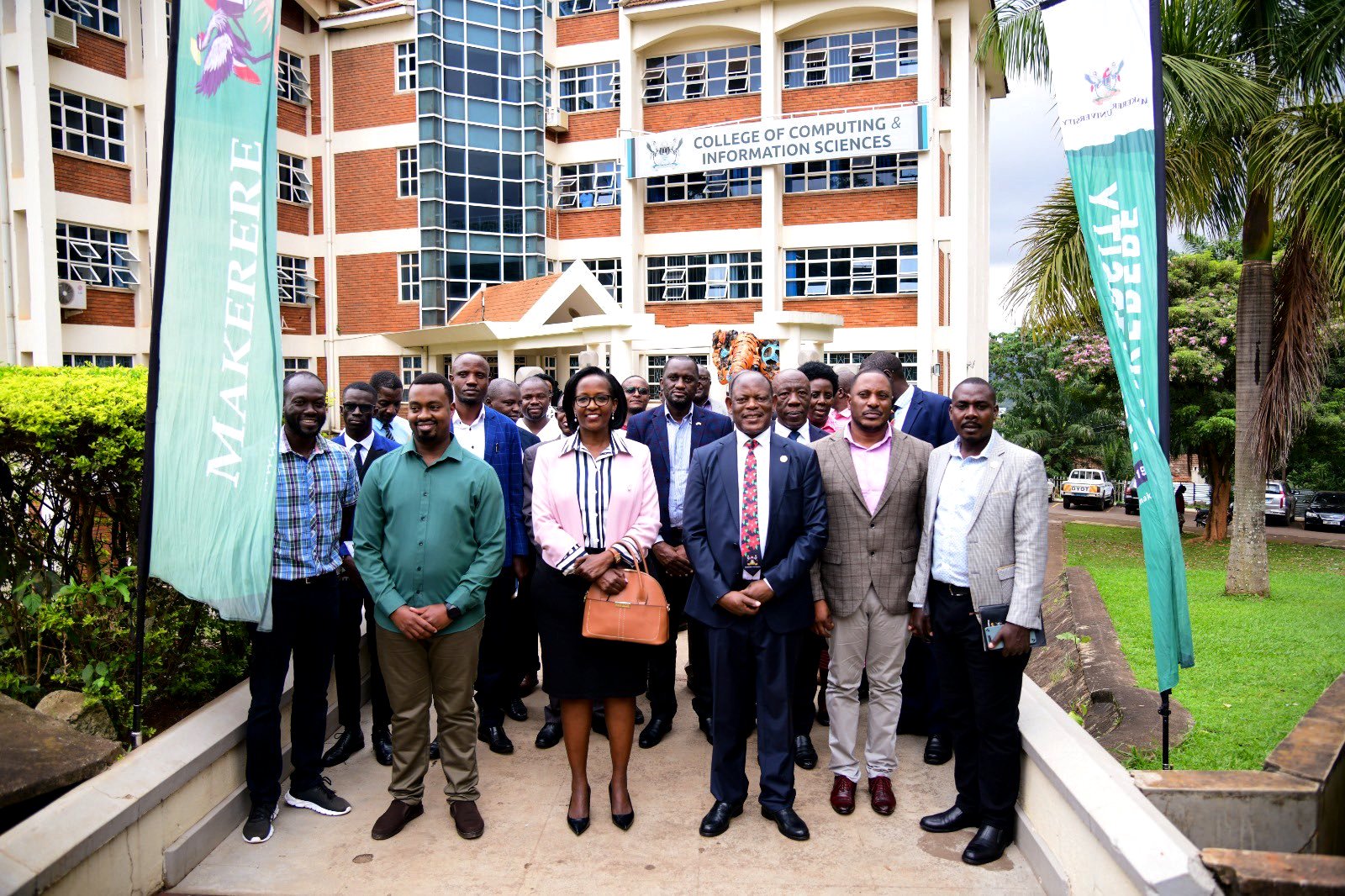 Mrs. Lorna Magara (3rd Left), Prof. Barnabas Nawangwe (3rd Right), Ms. Samuel Mugabi (2nd Right), Mr. Amon Muteganda (Right) and other officials pose for a group photo after the official launch of the Attendance Management System on 3rd May 2024. Launch of the staff and students attendance management system by Chairperson of Council, Mrs. Lorna Magara, 3rd May 2024, Conference Room, Level 4, College of Computing and Information Sciences (CoCIS), Makerere University, Kampala Uganda, East Africa.