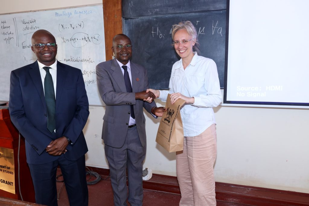Prof. Edward Bbaale (Centre) and Prof. James Wokadala (Left) hand over a gift to Prof. Mariangela Guidolin. Makerere University School of Statistics and Planning-University of Padova, Italy dynamic workshop on multivariate statistics and time series analysis, 11th to 20th June 2024, Makerere University, Kampala Uganda, East Africa.