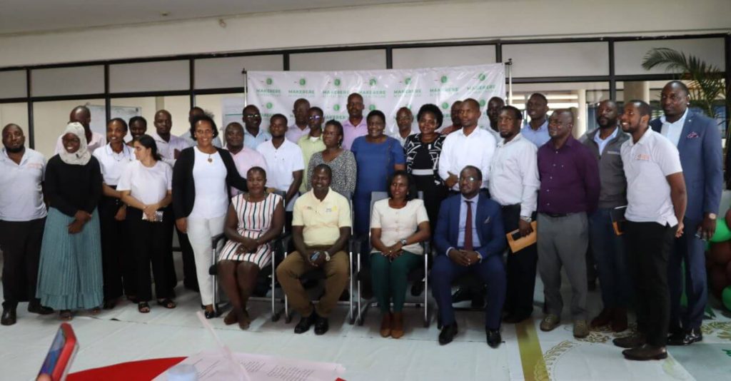 The participants pose for a group photo with the PI Dr. Rose Nakasi. Launch of AI Health Lab, Block B, College of Computing and Information Sciences (CoCIS), Makerere University, Kampala Uganda, East Africa.