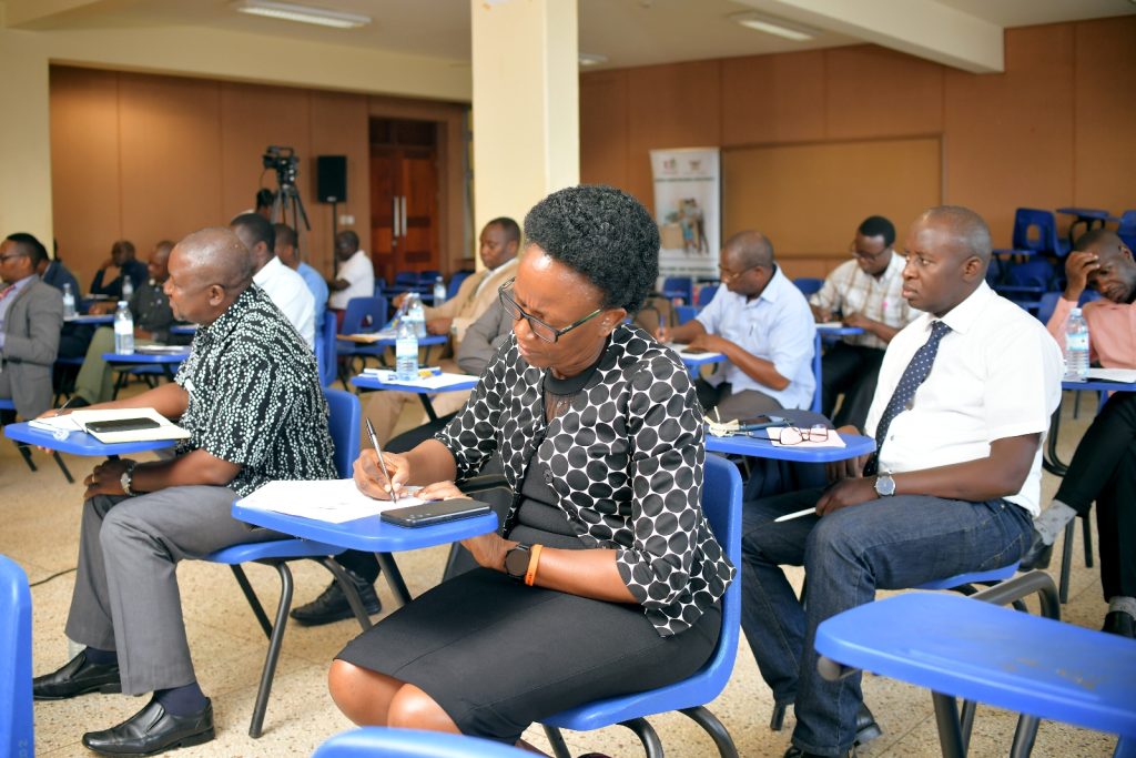 Participants follow proceedings during the Round Table discussion. Frank Kalimuzo Central Teaching Facility, Makerere University, Kampala Uganda, East Africa.