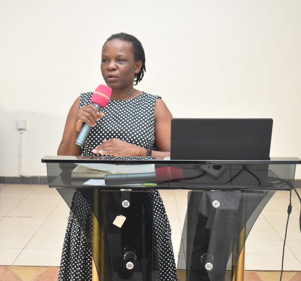 The Representative of the CAO Mukono District delivering her remarks. Makerere University, Kampala Uganda, East Africa, Department of Zoology, Entomology and Fisheries Sciences (ZEFS), College of Natural Sciences (CoNAS) Mitigating the Effects of Environmental Pollution from aquaculture on freshwater resources in Lake Victoria Basin (MEEP) Mak-RIF funded project Dissemination of the research findings, 26th June 2024, Colline Hotel Mukono.