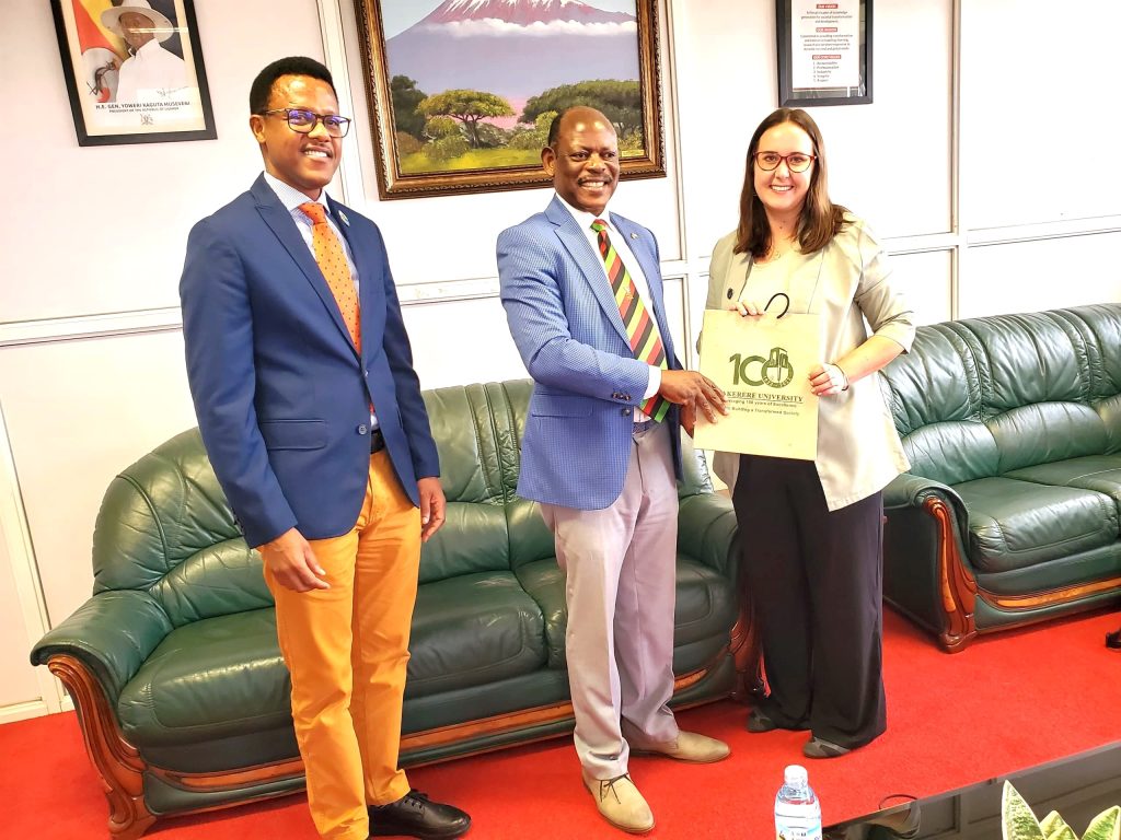 The VC presents sovernirs to Ms. Racheal Fahrenbach. Makerere University and Oregon State University MoU Signing to collaborate on i) Exchange of scholars and faculty staff, ii) Exchange of undergraduate and graduate students for research and study, iii) Exchange of academic information and materials, iv) Joint research activities and publications, v) Participation in conferences and academic meetings vi) Joint running of short-term academic programs, vii) Resource mobilization, 19th July 2024, Frank Kalimuzo Central Teaching Facility, Kampala Uganda, East Africa.