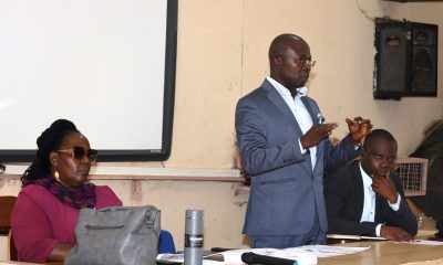 Dr. Muhammad Kiggundu Musoke (Centre) flanked by Ms. Joanna Kayaga (Left) and Mr. Kansiime Edward (Right) addresses students. College of Education and External Studies (CEES), Senior 6 students from Mbogo High School Career Guidance Session, August 2024, School of Education, Makerere University, Kampala Uganda, East Africa.