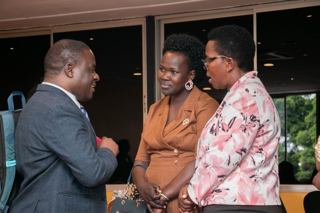 Dr. Peter Waiswa, an Associate Professor at MakSPH interacts with legislators Hon. Nancy Acora, the Lamwo District Woman MP and the Mbarara district woman MP Ayebare Margaret Rwebyambu. Makerere University School of Public Health (MakSPH) Innovations for Choice and Autonomy (ICAN) project study I-CAN/Nsobola/An atwero social support intervention, piloted in Mayuge and Oyam districts in 2023, Dissemination on July 31, 2024 at Golden Tulip Hotel, Kampala Uganda, East Africa.