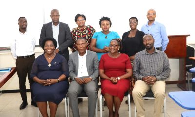 Attendees in a group photo after the handover ceremony. Handover of the College of Humanities and Social Sciences (CHUSS) Bursar Office from Ms. Joseline Biganja to Mr. Michael Mbaine, 6th August 2024, CHUSS Smart Room, Makerere University, Kampala Uganda, East Africa.