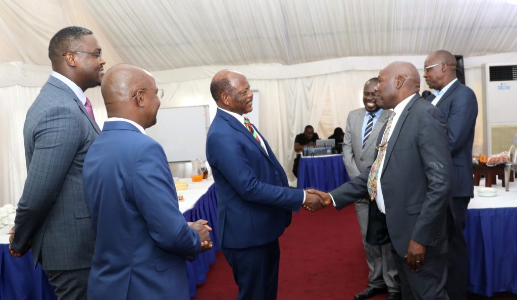 Prof. Barnabas Nawangwe welcomes the Minister Okaasai Opolot to the venue. EfD Uganda, Makerere University, Kampala Uganda, East Africa graduation of Third Cohort of the Inclusive Green Economy (IGE) Capacity Building Program Fellows, 7th August 2024, Kampala Sheraton Hotel.