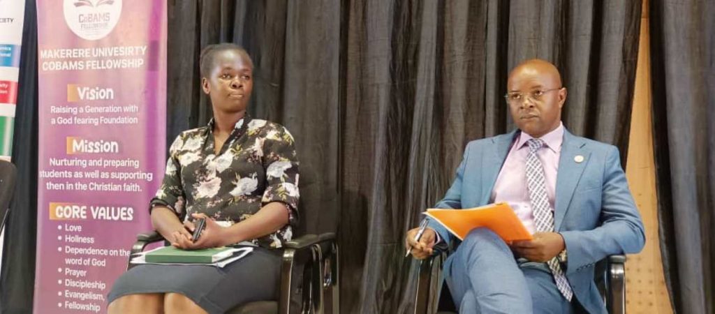 Prof. Edward Bbaale (Right) and a member of staff at the orientation. Freshers Orientation for Academic Year 2024/2025, College of Business and Management Sciences (CoBAMS), 6th August 2024, Yusuf Lule Central Teaching Facility, Makerere University, Kampala Uganda, East Africa.