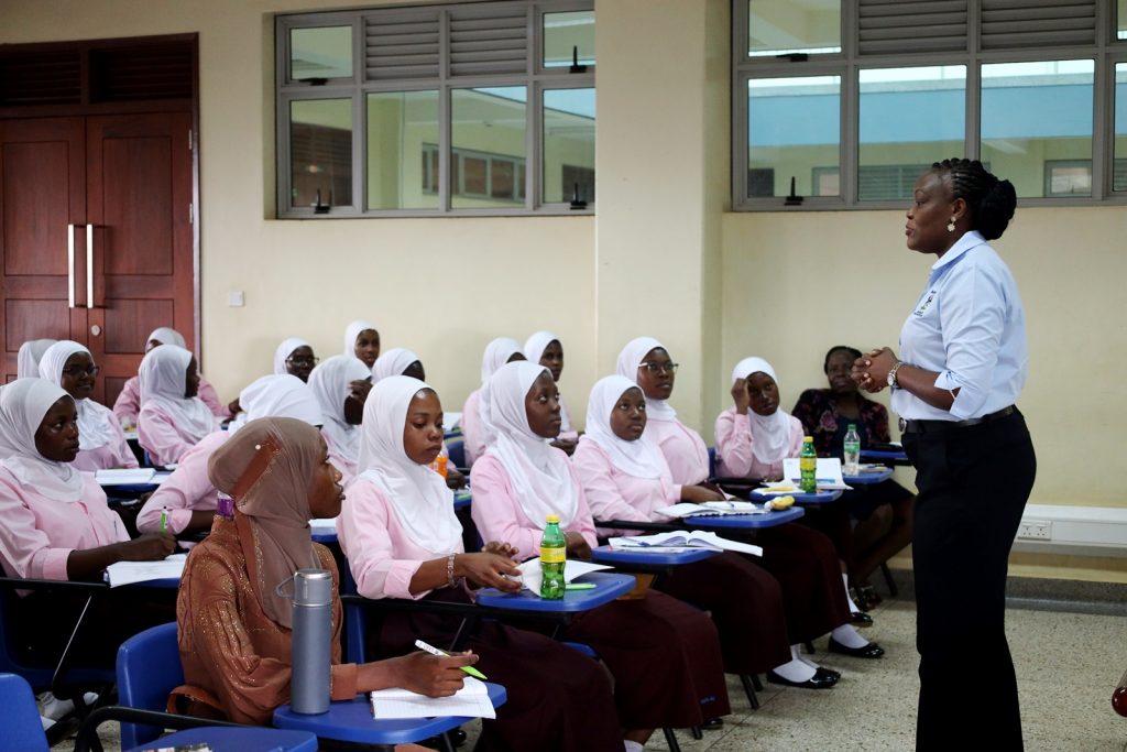 Dr. Patricia Ndugga addresses staff and S.6 students of Mbogo High School. College of Business and Management Sciences(CoBAMS), Senior 6 students from Mbogo High School Career Guidance Session, August 2024, Yusuf Lule Central Teaching Facility, Makerere University, Kampala Uganda, East Africa.