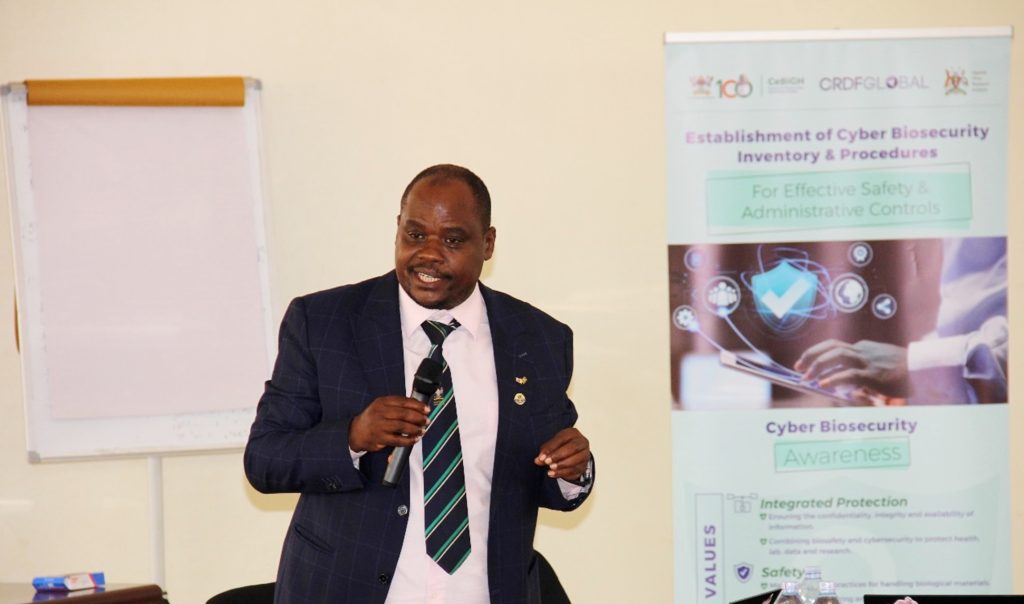 Associate Professor Lawrence Mugisha giving an overview of the project. Makerere University and Uganda Virus Research Institute Pilot Cyberbiosecurity Project to Safeguard Laboratory Facilities, Workshop, 16th August 2024, Centre for Biosecurity and Global Health, Kampala Uganda, East Africa.