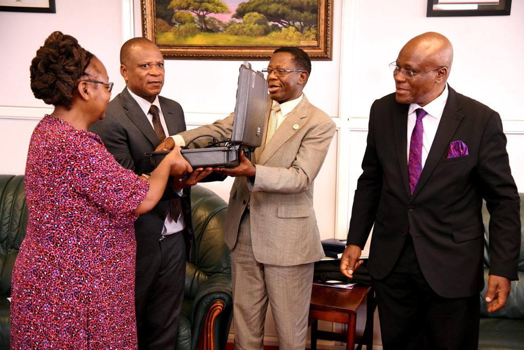 Prof. Buyinza Mukadasi (2nd Right) hands over the equipment to CEDAT Principal-Prof. Moses Musinguzi and Dean School of Engineering, Prof. Dorothy Okello. Makerere University on 14th August 2024 received portable lighting test equipment from the East African Centre of Excellence for Renewable Energy and Efficiency (EACREEE), the execution partner of the Energy Efficient Lighting and Appliances (EELA) project in East and Southern Africa.