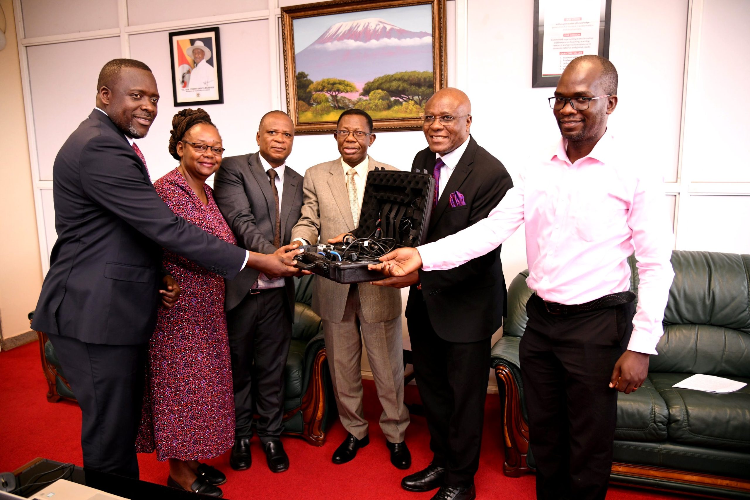 Ag. Vice Chancellor, Prof. Buyinza Mukadasi (3rd R) with Left to Right: Mr. Yusuf Kiranda, Prof. Dorothy Okello, Prof. Moses Musinguzi, Canon Goddy Muhanguzi Muhumuza and another official at the handover of equipment by EACREEE on 14th August 2024. Makerere University on 14th August 2024 received portable lighting test equipment from the East African Centre of Excellence for Renewable Energy and Efficiency (EACREEE), the execution partner of the Energy Efficient Lighting and Appliances (EELA) project in East and Southern Africa.